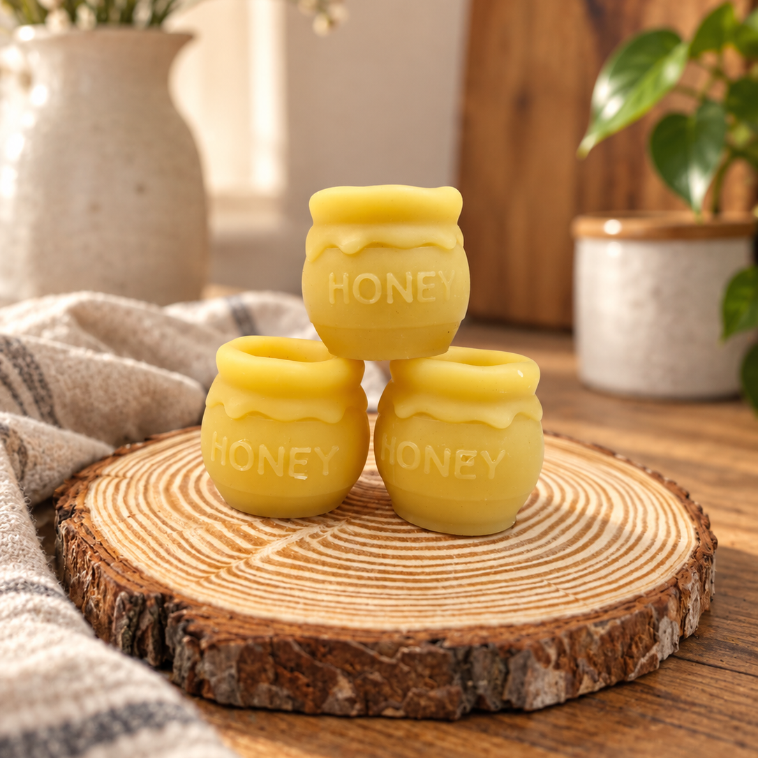 100% pure beeswax wax melts in a honey pot shape. 3cm x 3cm. Wax melts.